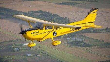Garnet McPherson flying Insights' Plane